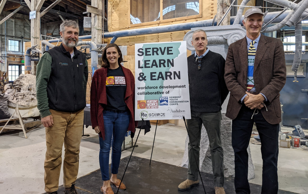 Directors of Serve, Learn & Earn collaborating organizations pose for photo.