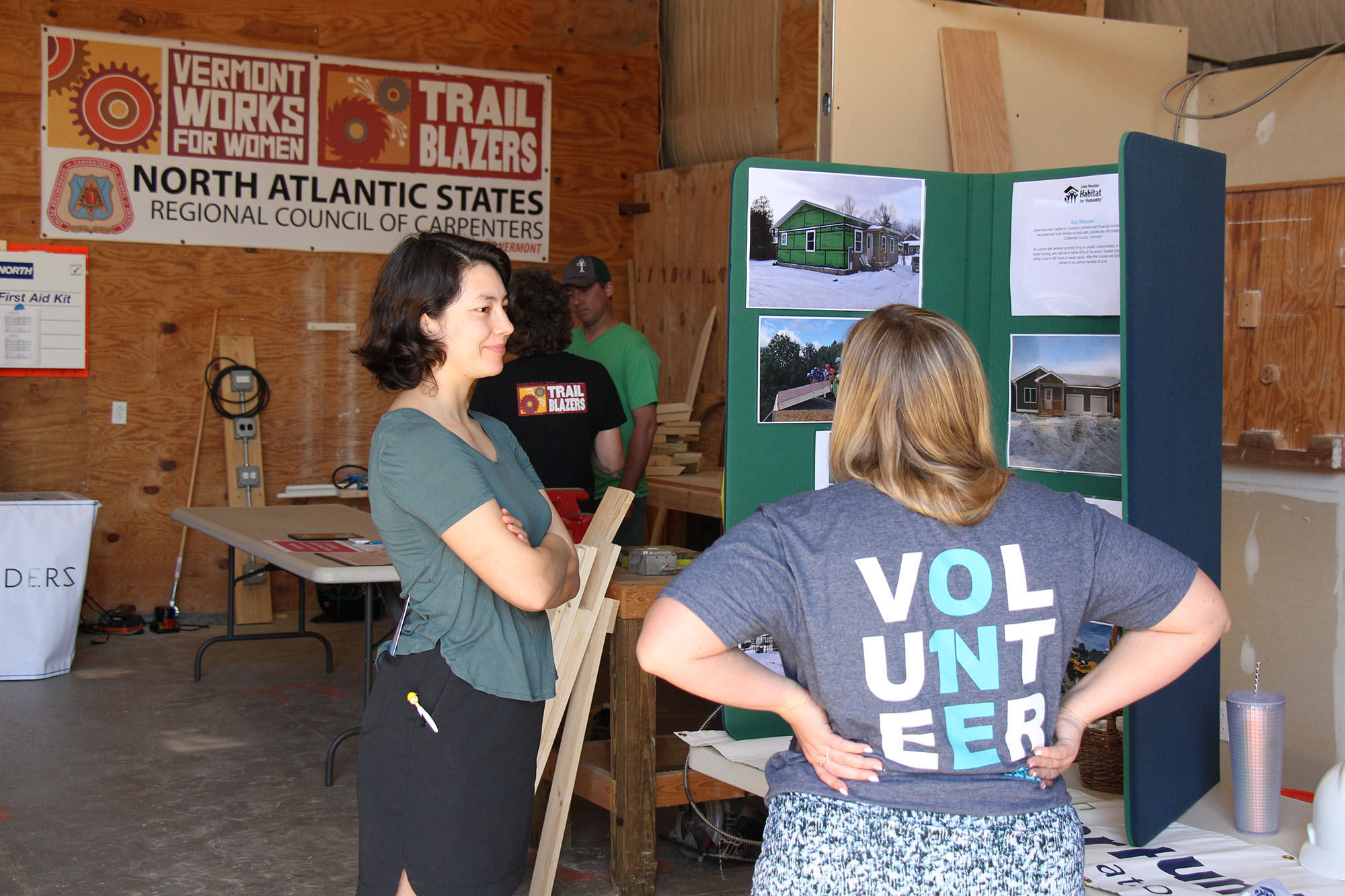 A Trailblazers Program participant attends a Vermont Works for Women hosted job fair with local employers who volunteer their time to discuss career pathways.