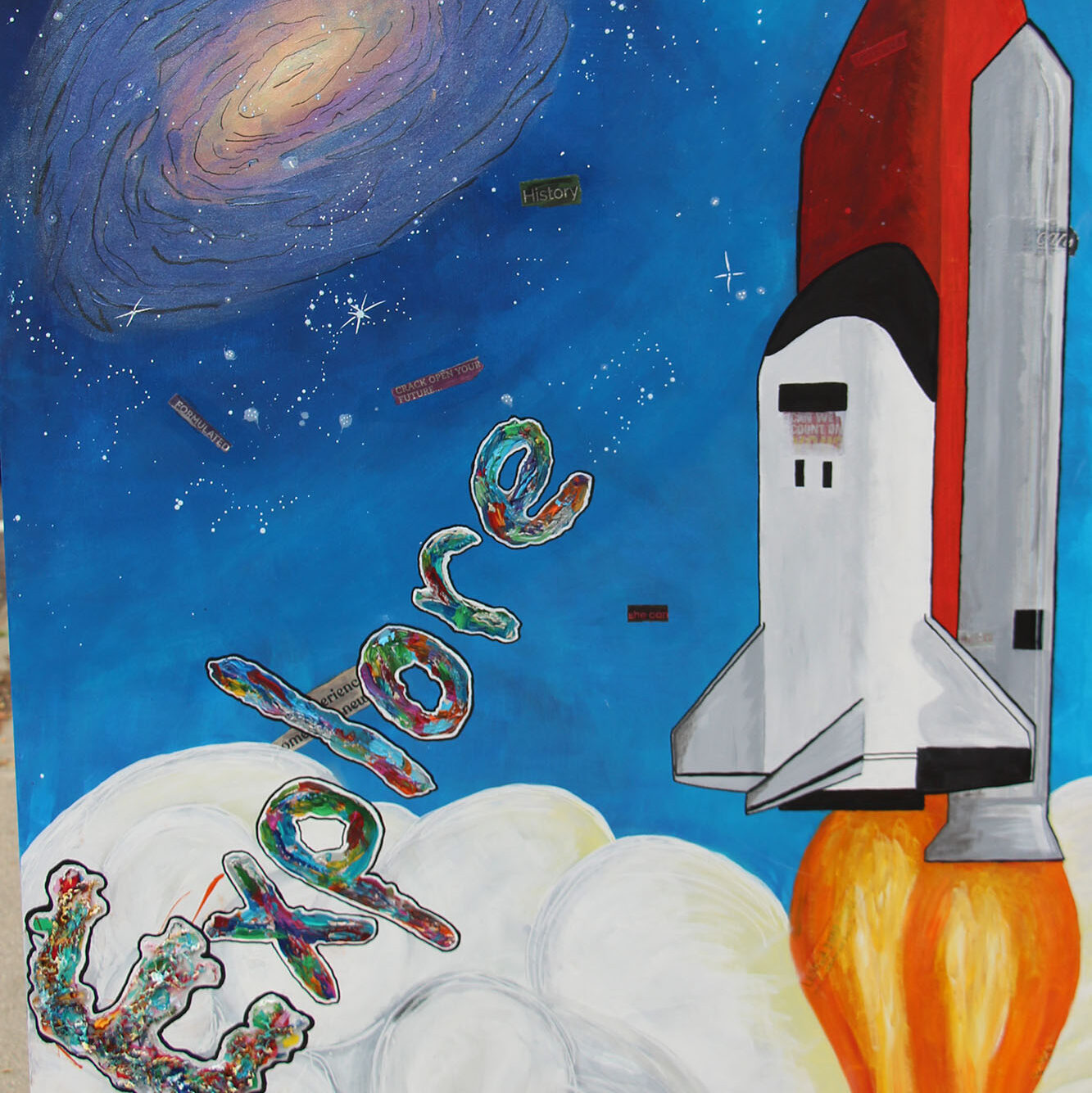 Artwork created by a former program participant in CRCF. Depicts spaceship shooting off into space and the word ‘Explore’.