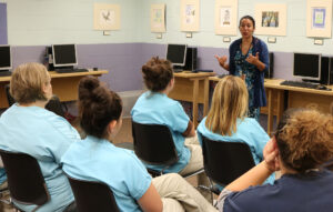 A guest speaker volunteers to share their career journey with incarcerated women at Chittenden Regional Correctional Facility.