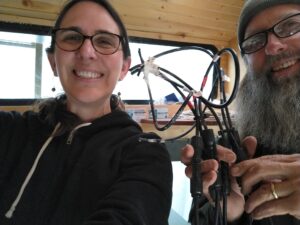 Trailblazers participant Kim interns with Joe Yodel of Tiny Solar Vermont and works on a solar installation for a camper van