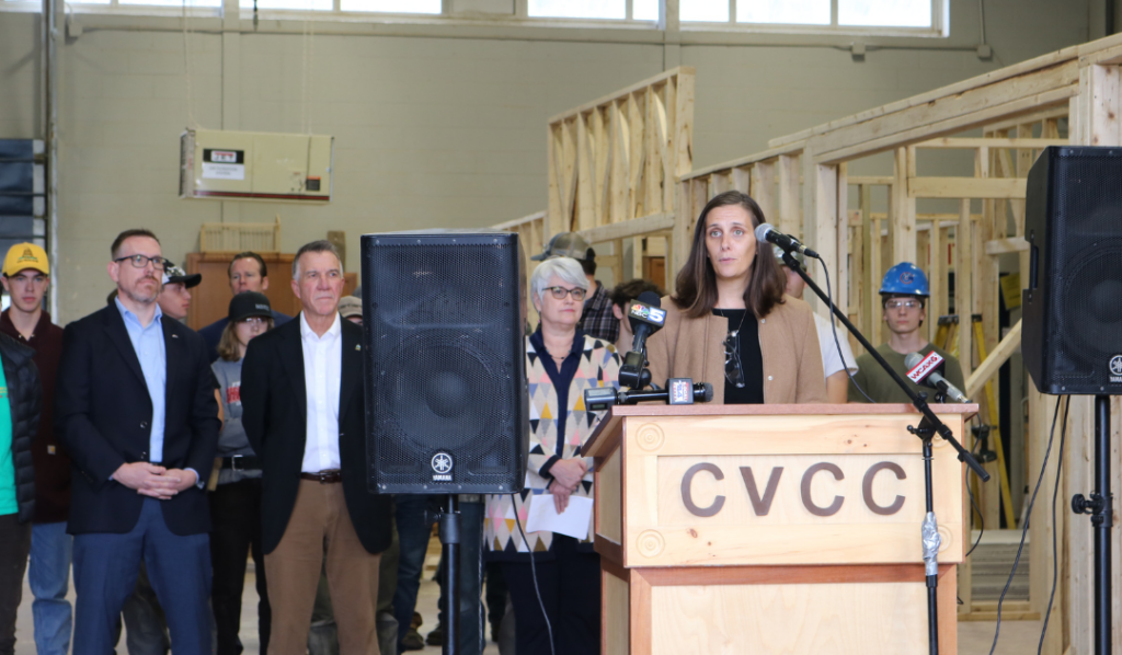 Rhoni Basden speaks at a press conference with VT Governor Phil Scott