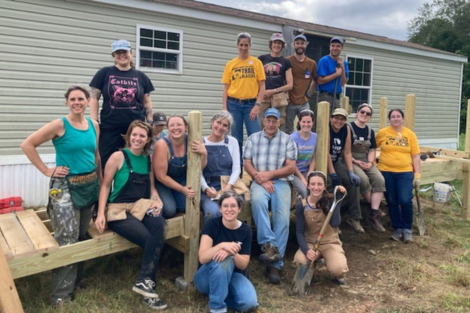 Hartford Trailblazers pose with a ramp they built with COVER Home Repair