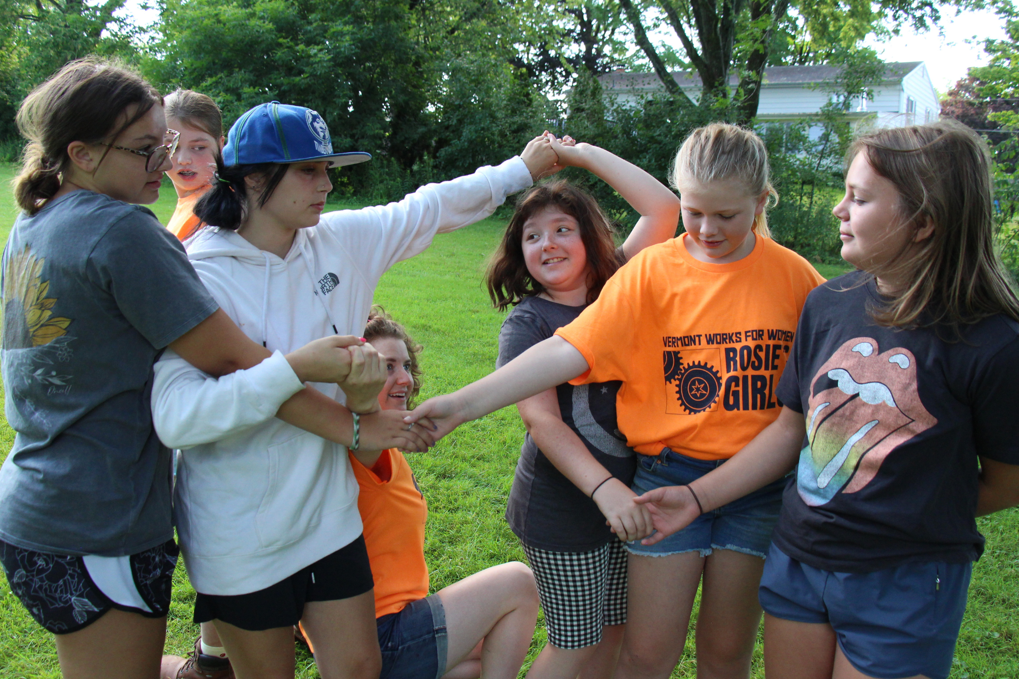 Rosie's Girls campers play a game at summer campe