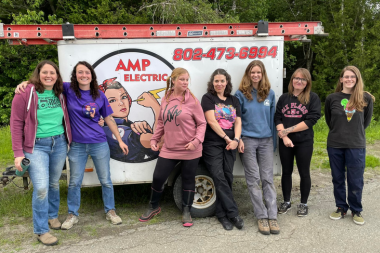 Trailblazers pose with Alli from AMP Electric.