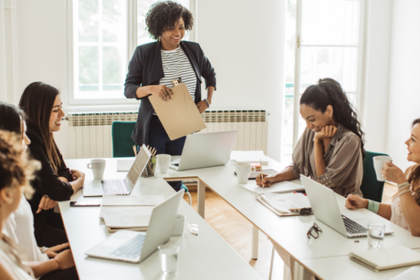 Group of women meet at work,