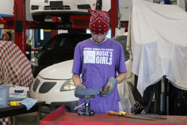 Rosie's Girls camper uses cold metal tools to shape metal.