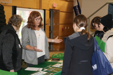 Vermont Community Broadband representatives talk to students at Women Can Do