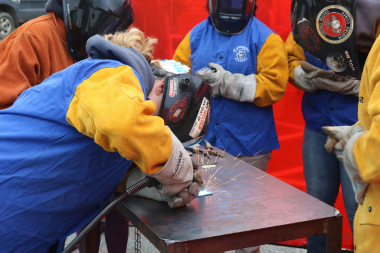 Student tries welding at Women Can Do 2024