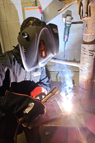 Tech Center student Jael Francis welds during class at North Country Career Center.