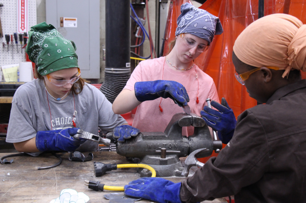 LIFT participants use metal work tools during the week-long trades program.