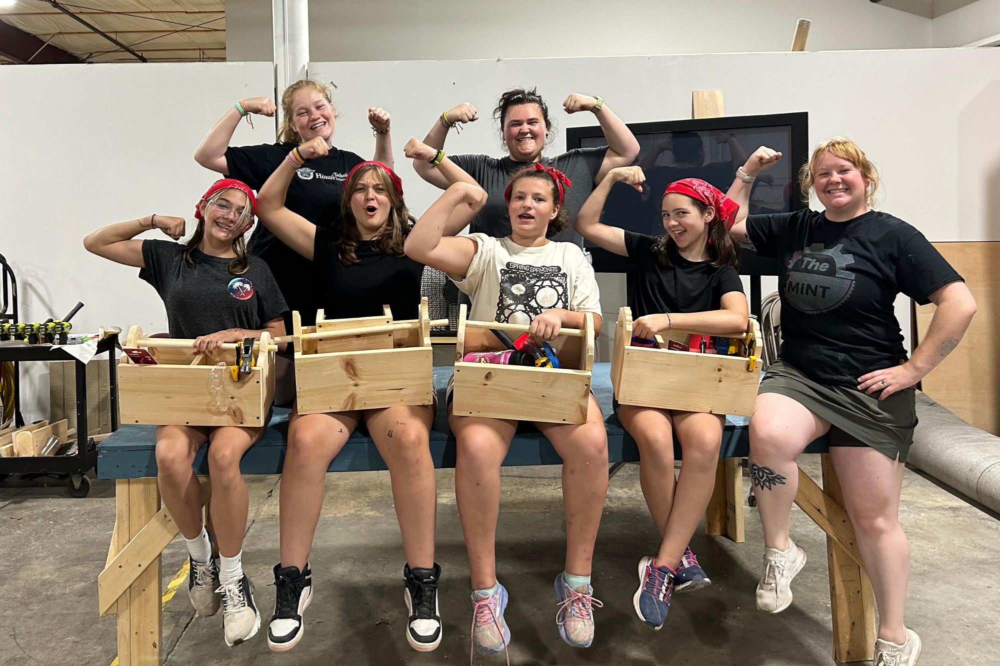 Campers at The MINT pose with their hand-built toolboxes