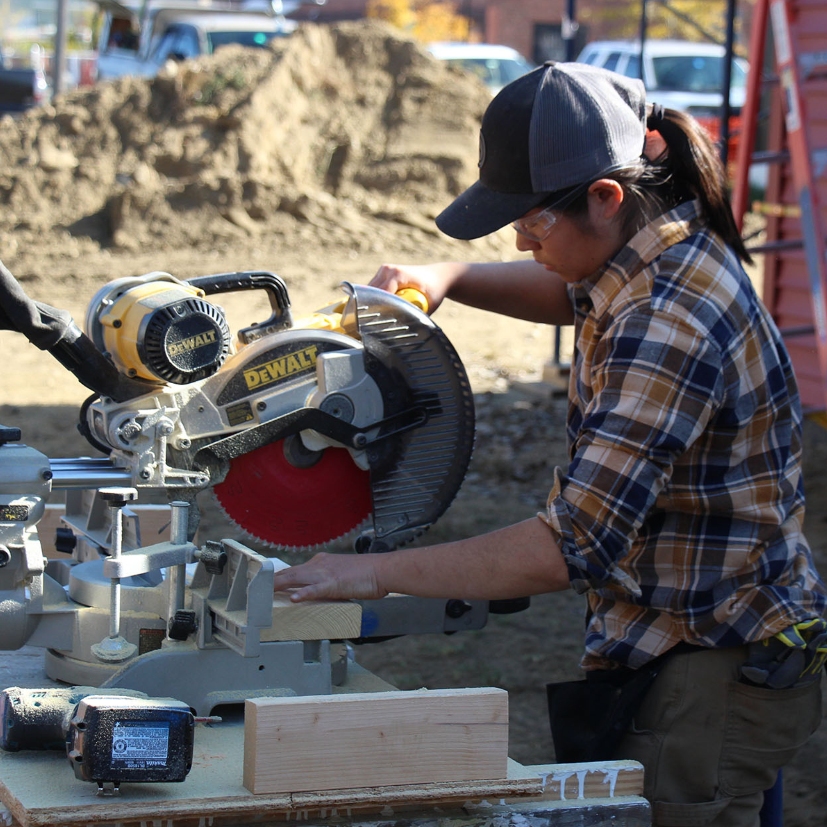 A Trailblazers participant uses a saw during the trades training program in Rutland.