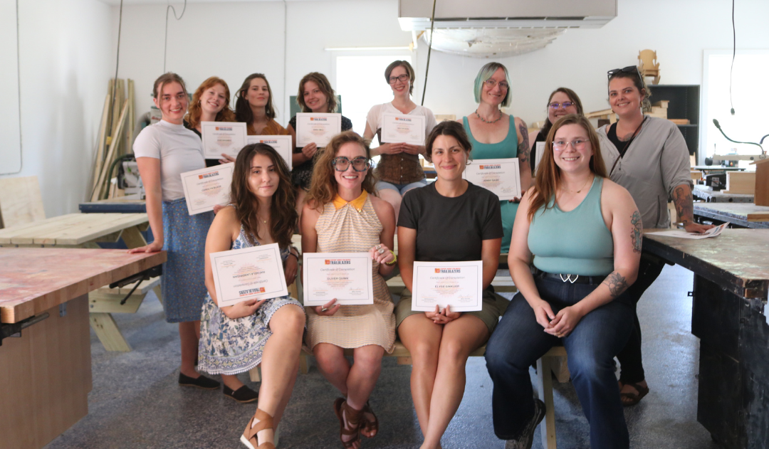 Swanton Trailblazers pose with their certificates at graduation
