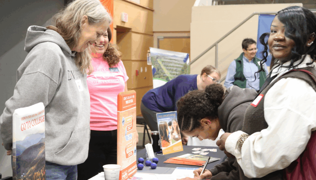 Student talks with CCV during the Resource Hall at Women Can Do 2025