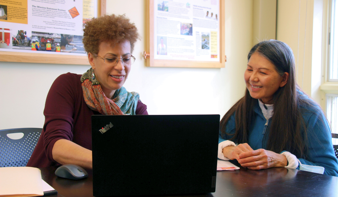 Paige Ruffner, VWW career coach works with a client on career support