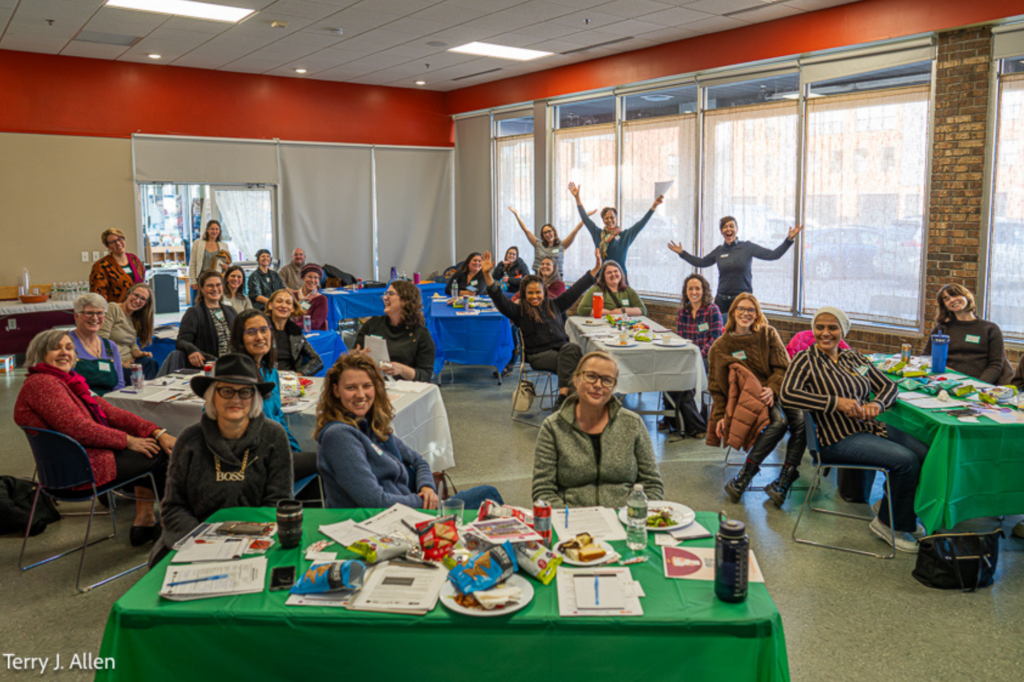 Women pose at after an event where they worked on their elevator pitches