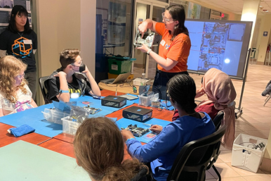 GlobalFoundries staff teach Rosie's Girls TECH campers about computers