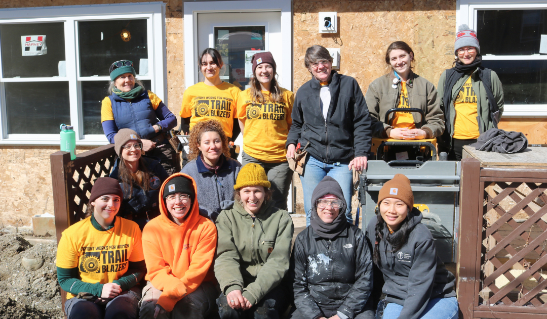 Members of our 23rd Trailblazers class pose for a group photo at a Habitat for Humanity site.