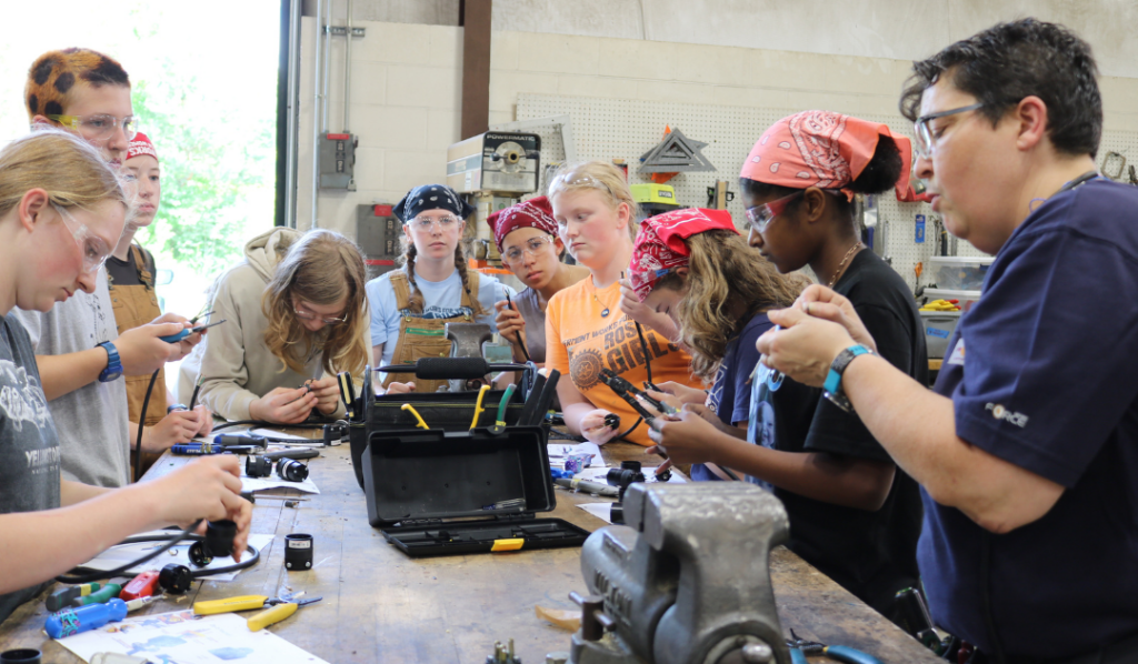 LIFT participants work on electrical wires during the weeklong summer program
