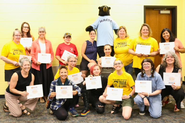 Hartford Trailblazers pose with their certificates after graduation