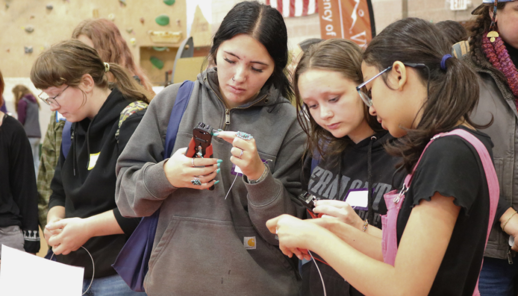 Students use hands-on tools at Women Can Do